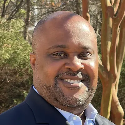 A person smiling for the camera