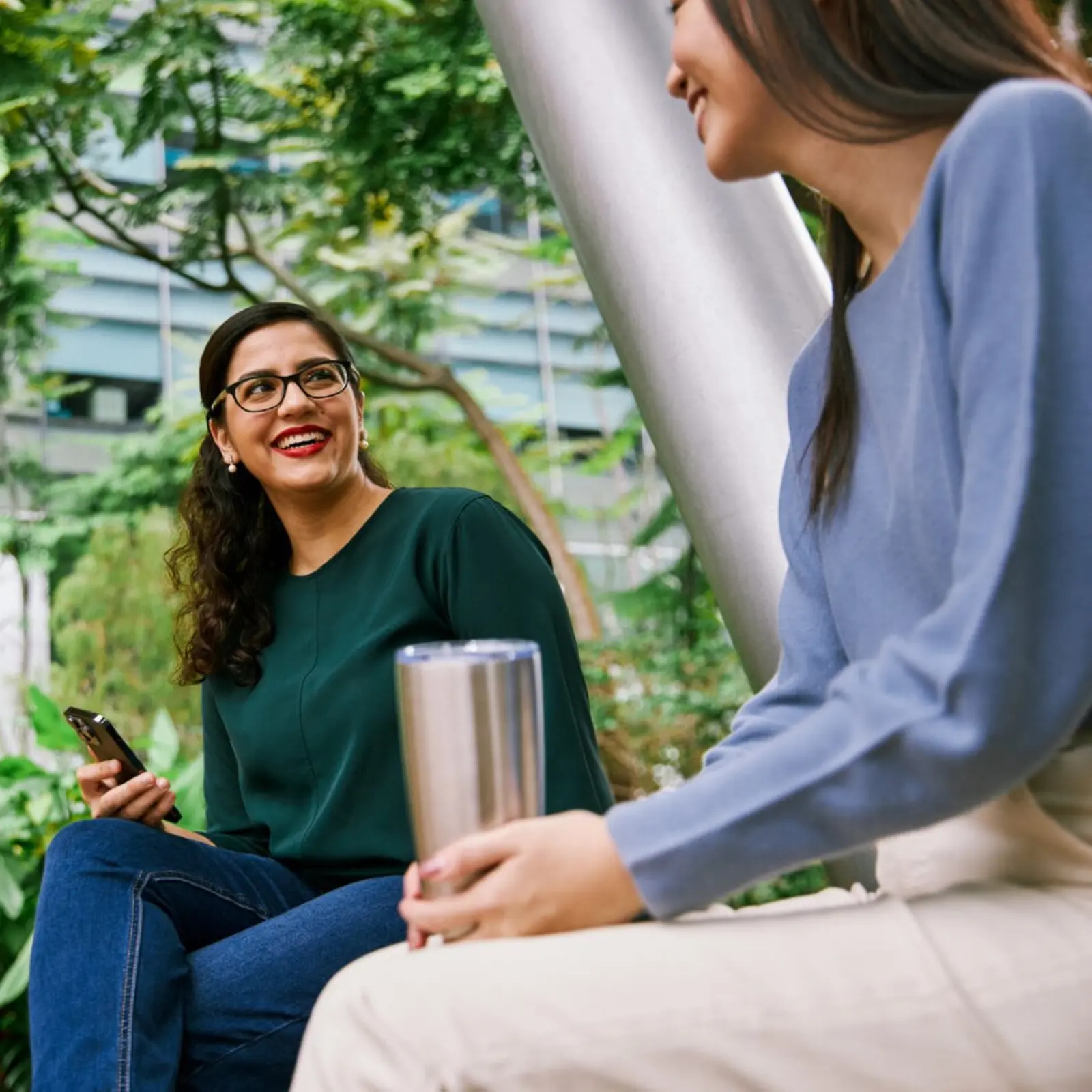 Two female colleagues having a nice chat.