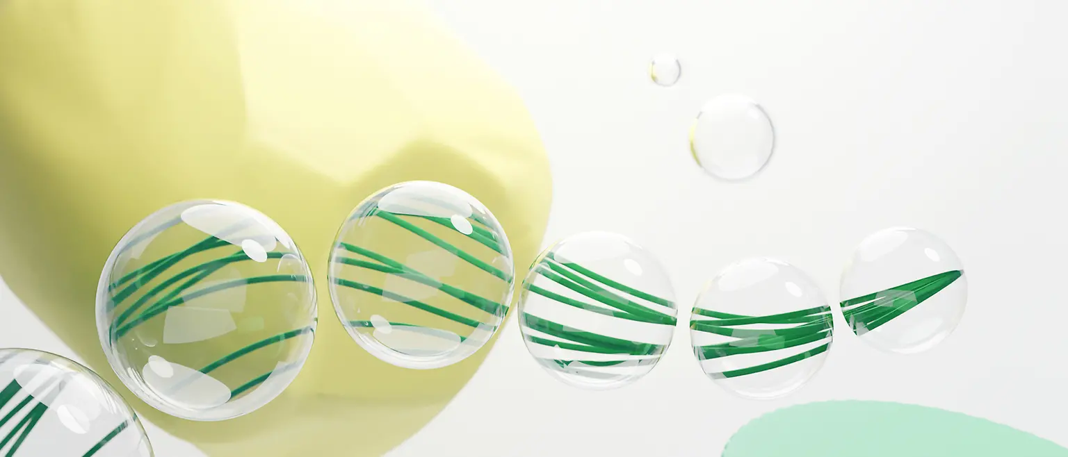 A CGI image of different natural yellow, green, and transparent elements symbolizing sustainability.