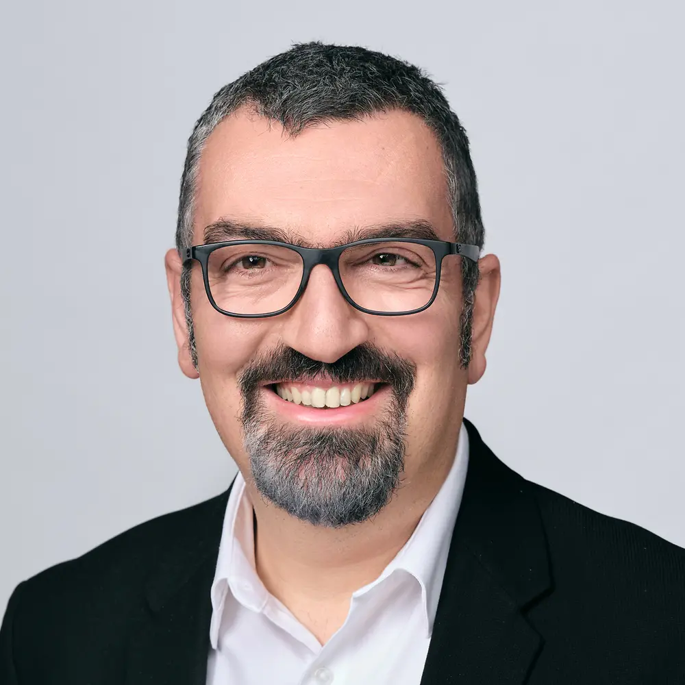 A portrait picture of Emrah Ozturk, Global Market Segment Manager for Aviation at Henkel.
